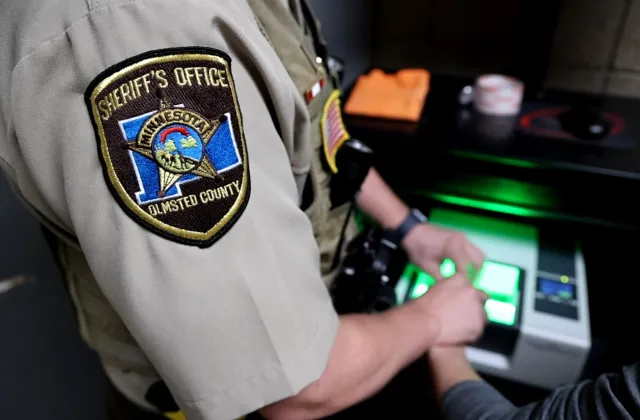 Sheriff's Office employee finger printing