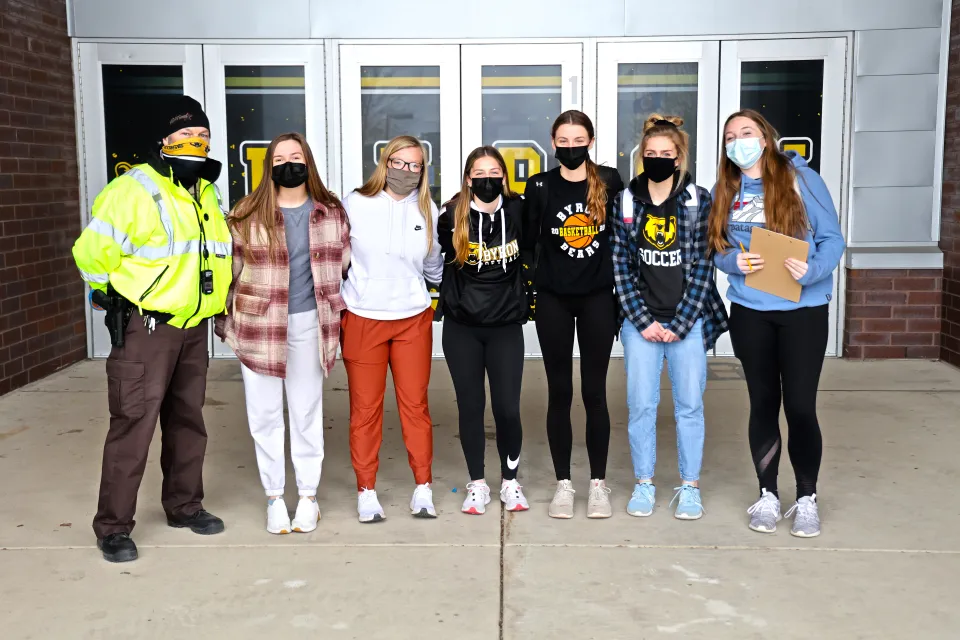 Group of students with Byron School Deputy Tom Olson