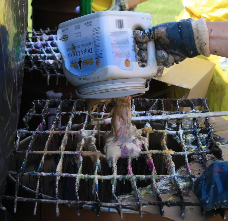 Paint being collected at a household hazardous waste mobile collection.