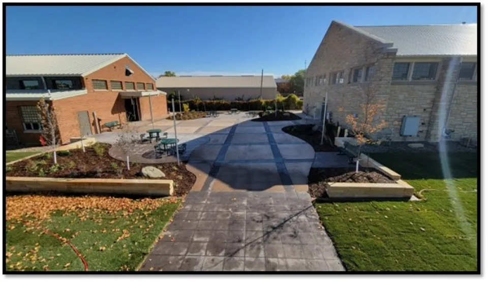 A new outdoor event plaza between Crawford Hall and Floral Hall .