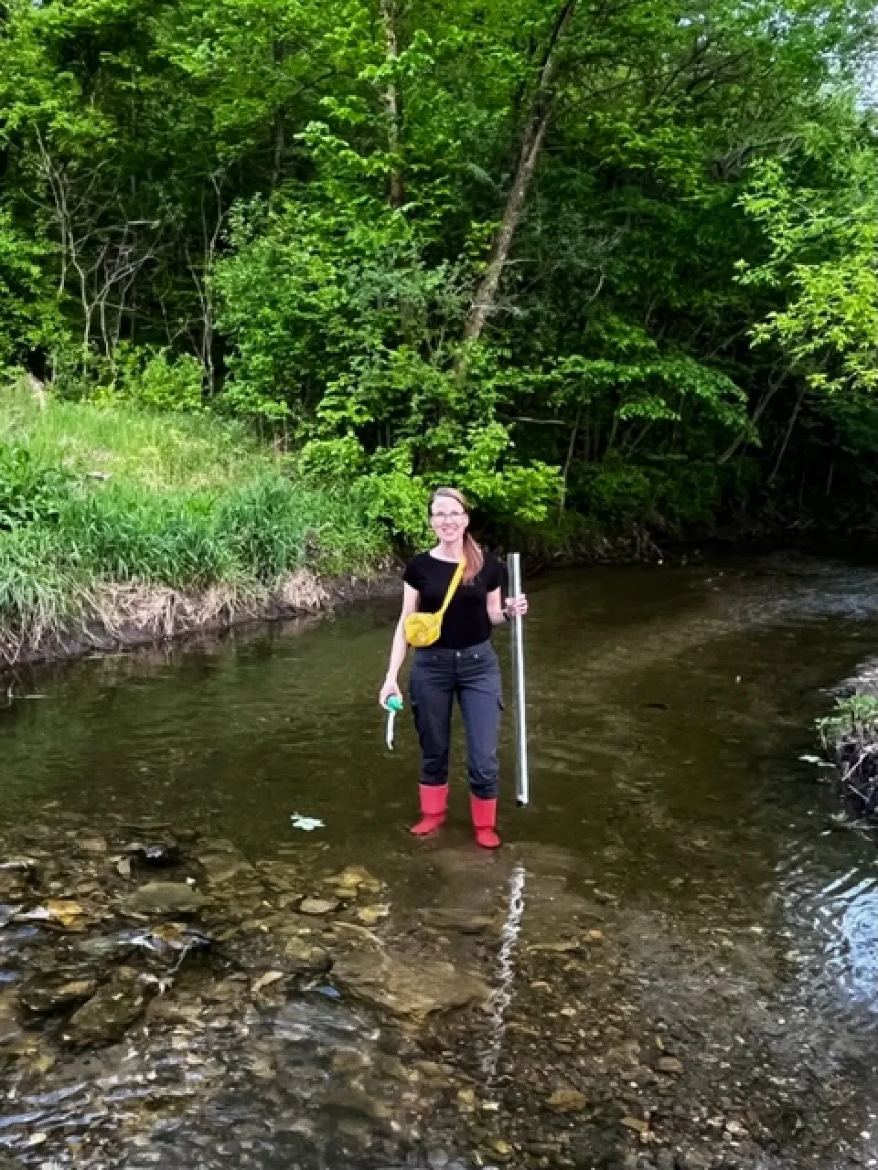 Zumbro Stream monitoring Lisa measuring temperature and turbidity