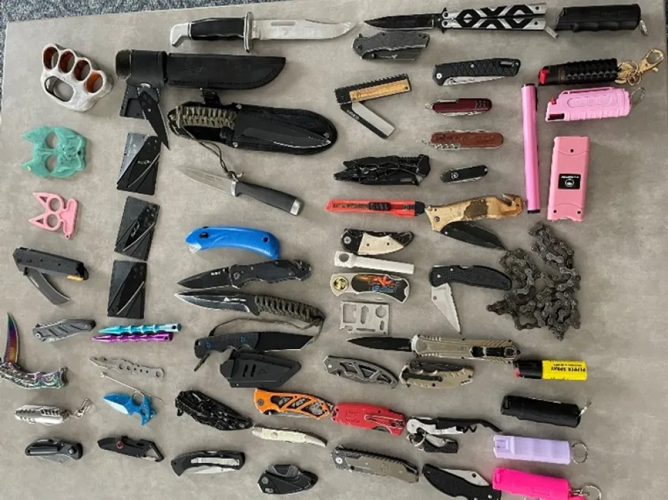 A photo of weapons collected at government center screening in 2023