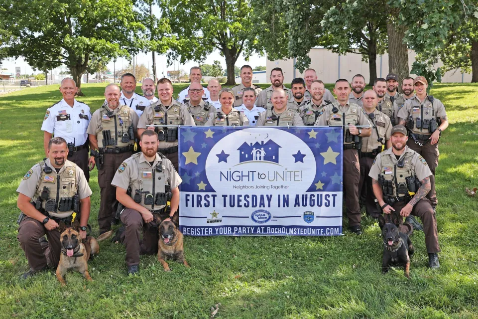 Members of the Olmsted County Sheriff gather for a photo before attending events. 