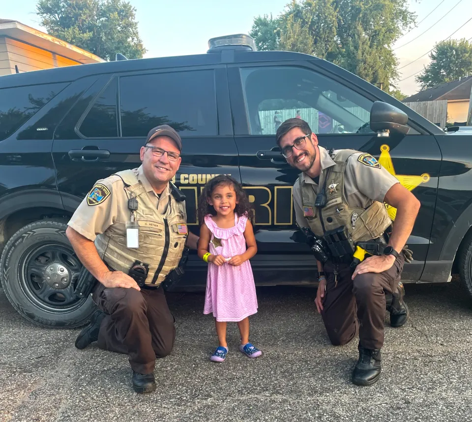 Deputies Corry Retzer and Reese Ferguson attend a Night to Unite event