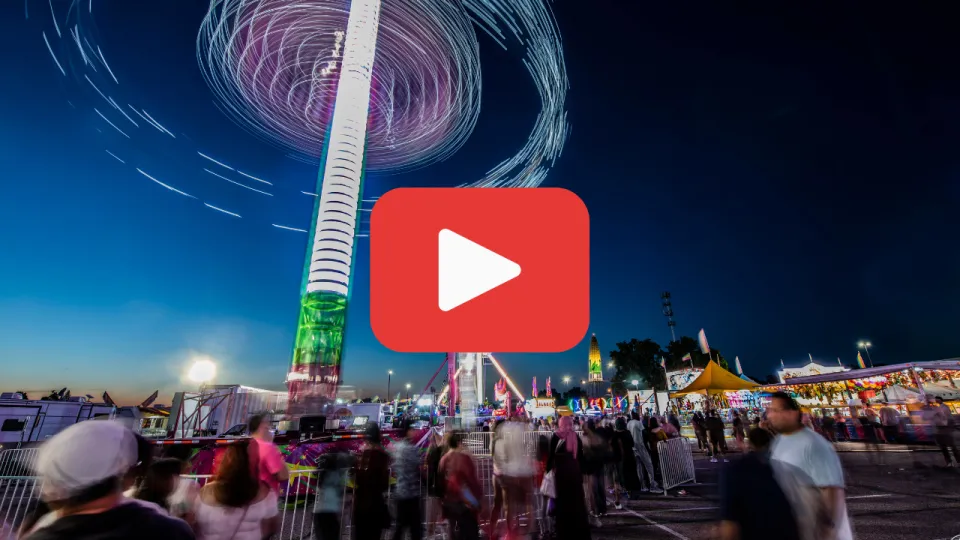 Olmsted County Fair ride with play button