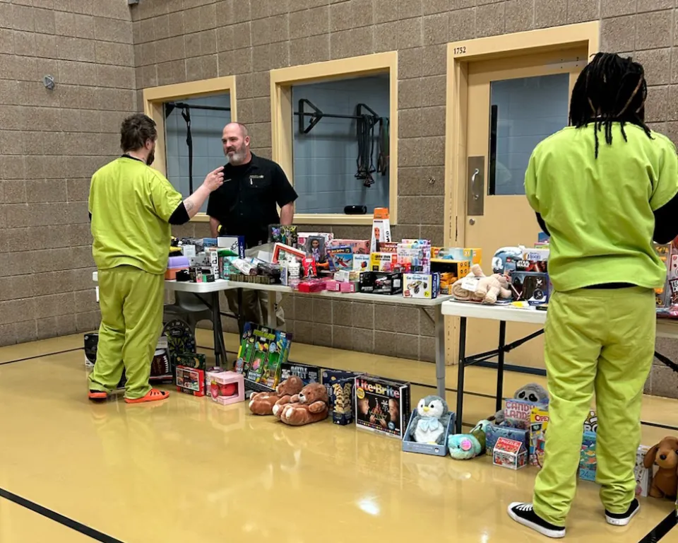 Detainees pick out donated gifts for their child/children