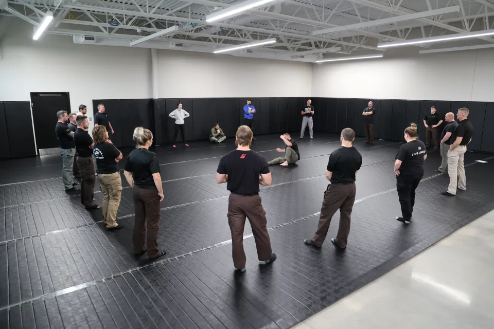 Sheriff's office staff training in mat room