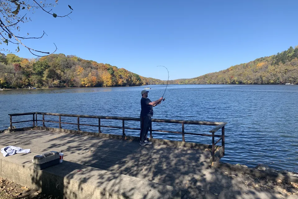 Actively fishing at the park