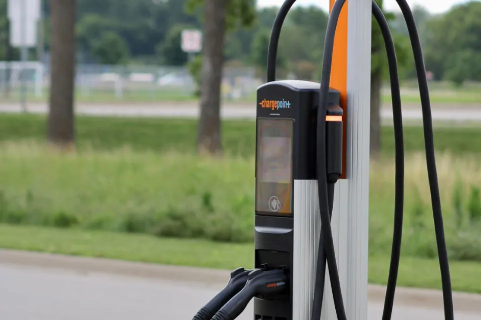 Electric vehicle charging station outside the 2100 building in Olmsted County.