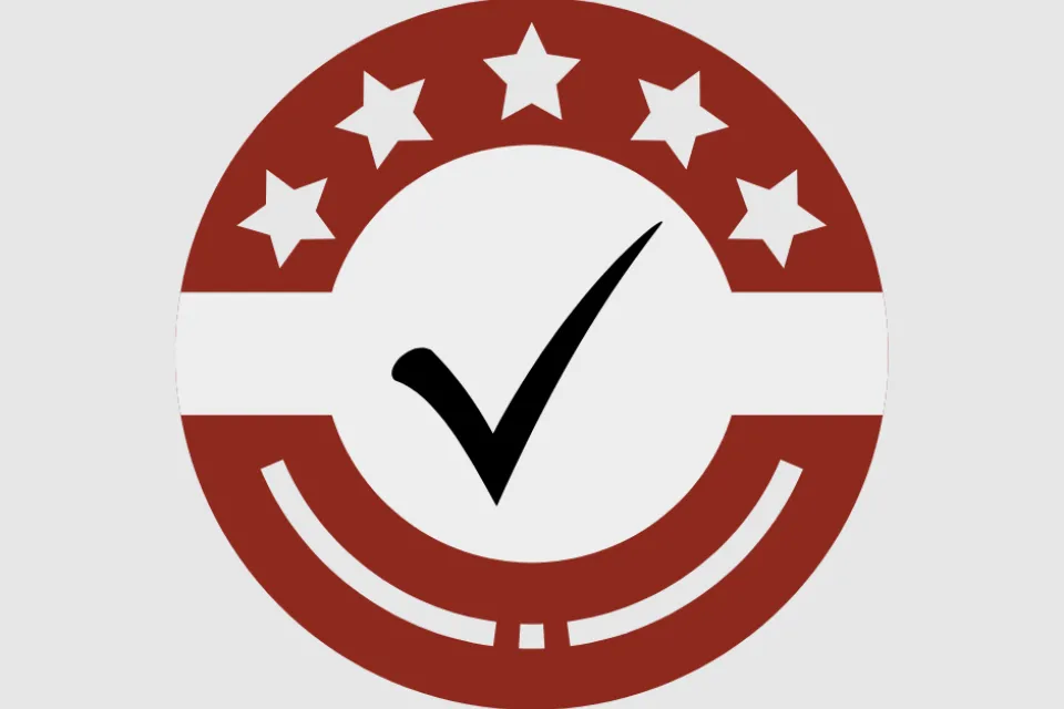 A check mark encased in a circle with five stars.